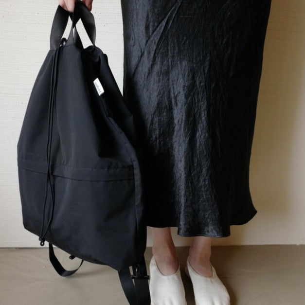 |unfold| String Backpack (Black)